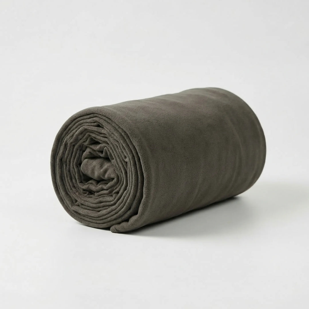 Stay warm with this lightweight fleece sleeping bag. Unisex, roll-up design for easy camping & hiking.