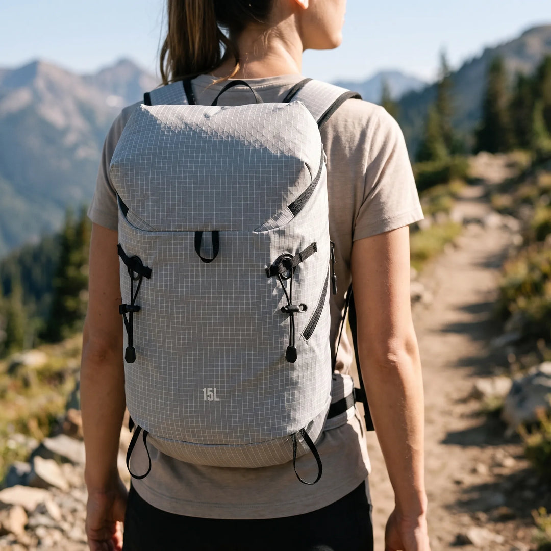 Unisex lightweight hiking hydration pack for trails, camping & outdoor adventures. Water repellent daypack.