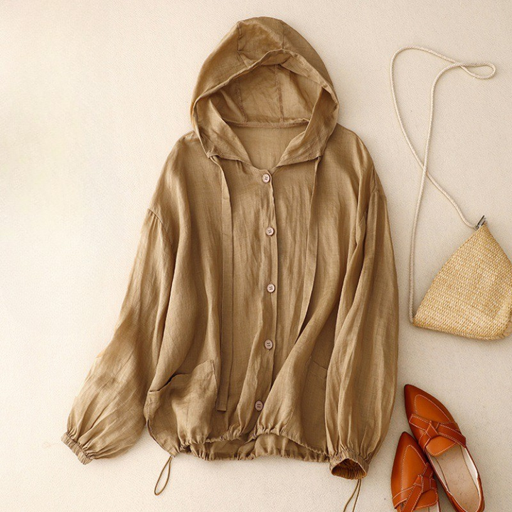 Lightweight linen blend hooded top, a breathable and comfortable choice for summer beach days.