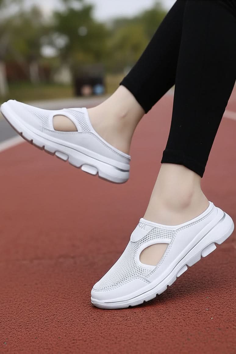 Comfortable unisex orthopedic loungewear slippers for foot pain relief.