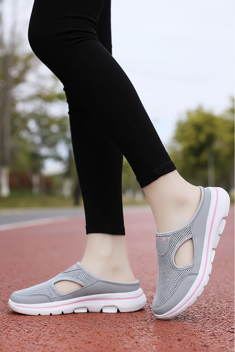 Lightweight unisex slippers with orthopedic sole, perfect casual comfort footwear.
