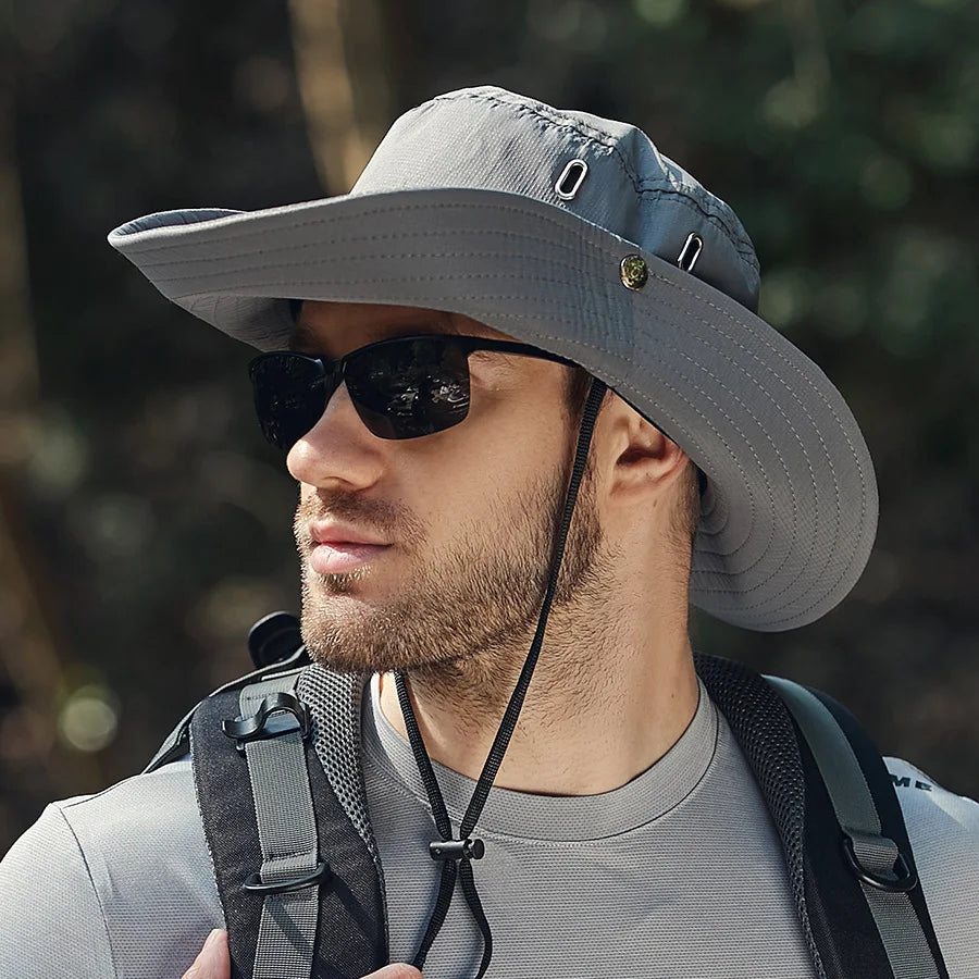 Unisex packable sun hat with adjustable drawstring. Provides UPF 50+ sun protection for all outdoor excursions.