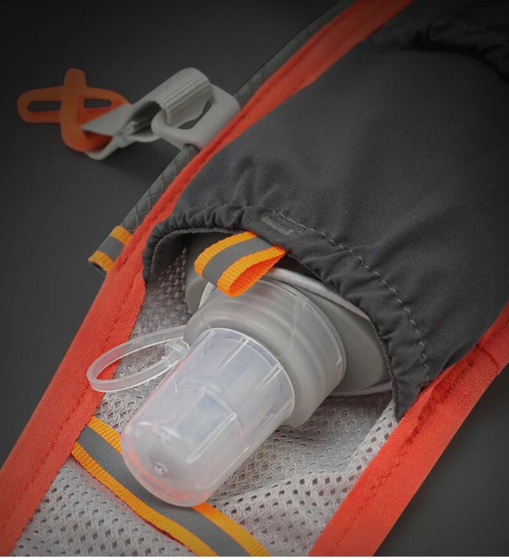 Essential StridePack lightweight trail running vest for hydration during races & outdoor adventures.