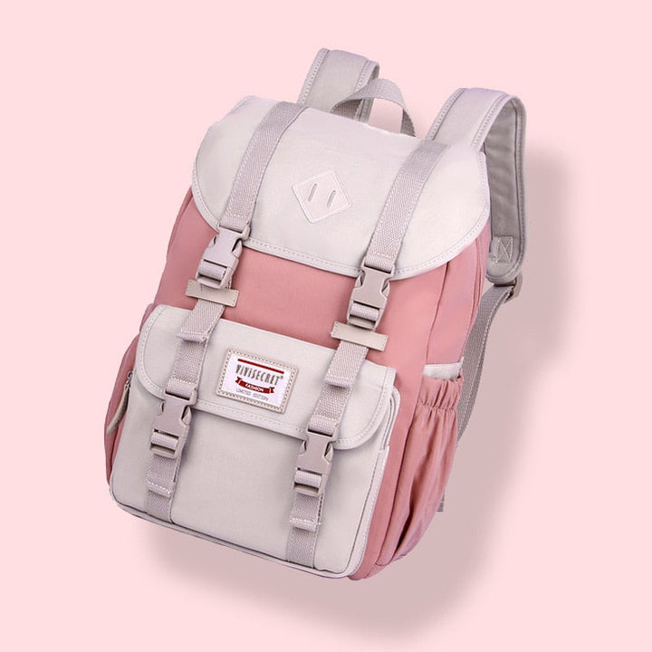 Water-resistant multi-compartment daypack for travel or school, fits laptop, unisex design