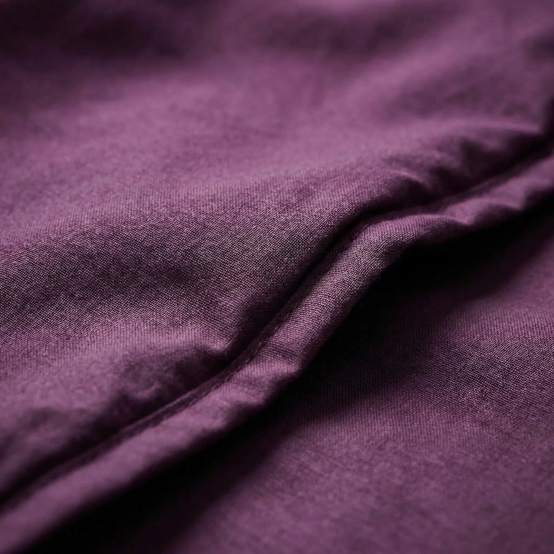 Compact, portable sleeping bag liner for travel, camping, and hiking. Essential lightweight hostel bedding.