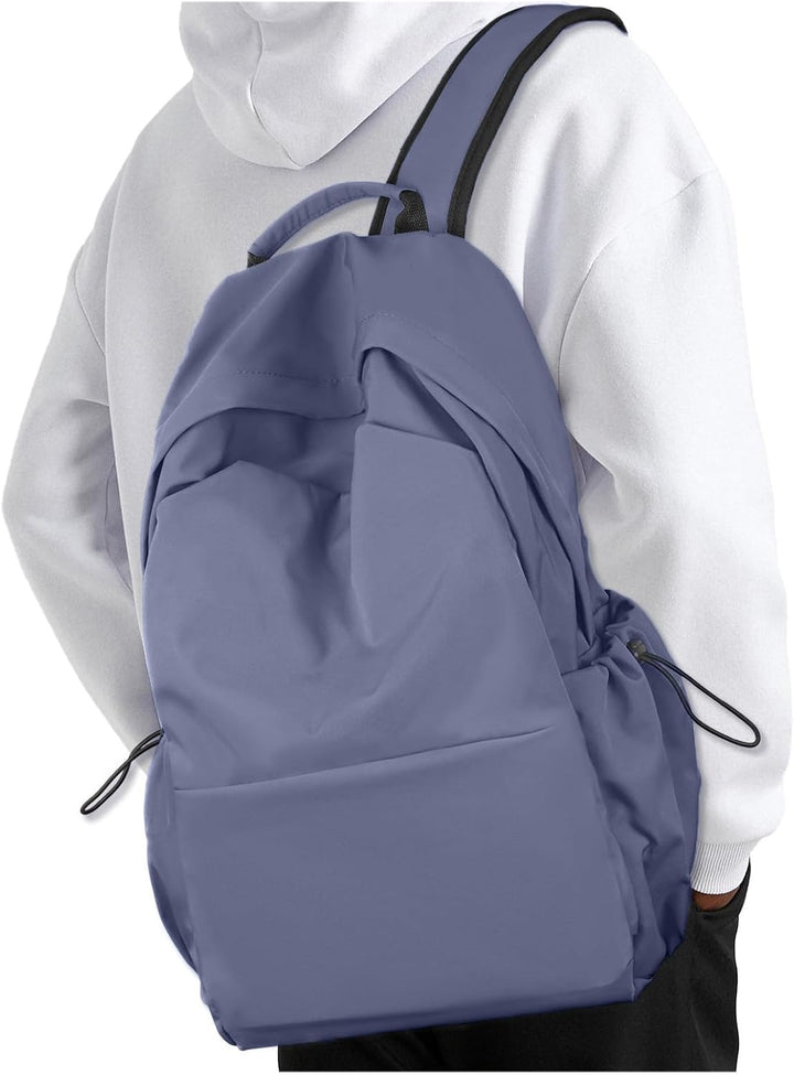 Close-up of a durable top handle on a black unisex lightweight laptop backpack