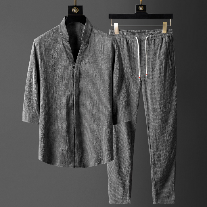 Breathable unisex white linen blend two-piece set, ideal relaxed fit loungewear for ultimate summer comfort.