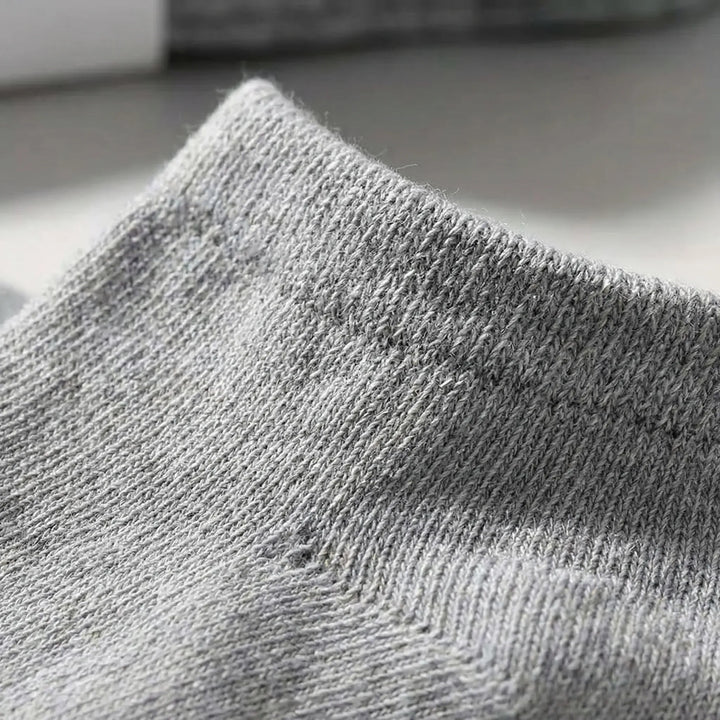 Multipack of black low-cut ankle socks, offering ultimate comfort & durability for unisex everyday wear.
