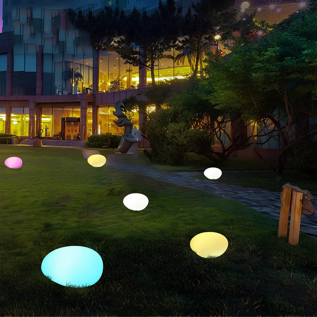 Sleek LumaStone outdoor lighting, cordless and solar powered, adds modern touch to your garden