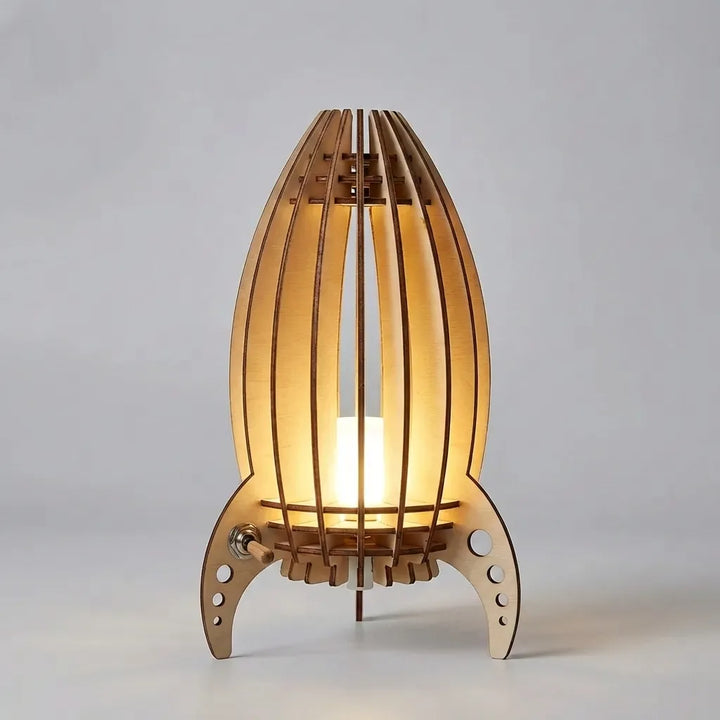 Stylish Luminocket LED table lamp in a rocket shape, providing ambient light for contemporary decor.