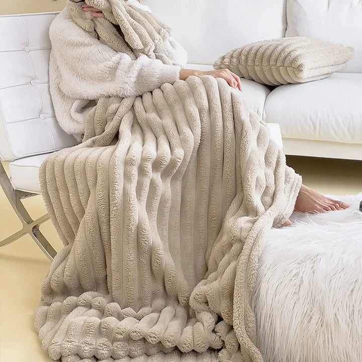 Unisex luxury plush comfort throw blanket in a cozy living room, perfect for relaxation