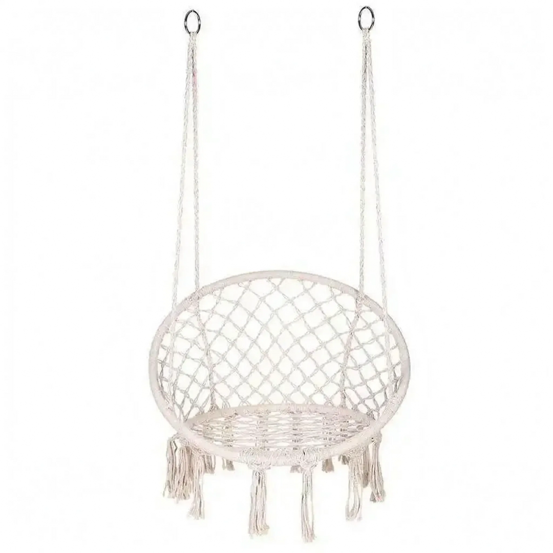 Stylish macrame hanging swing seat with fringe, suitable for bohemian decor.