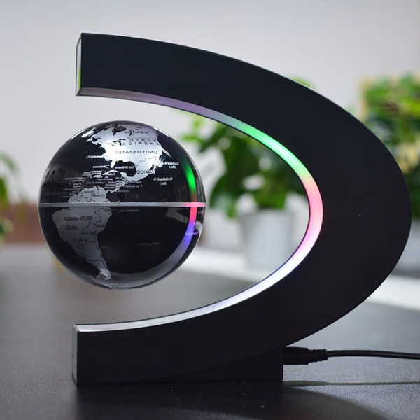 Modern magnetic floating globe with bright LED light, ideal as a desk lamp or office decor.