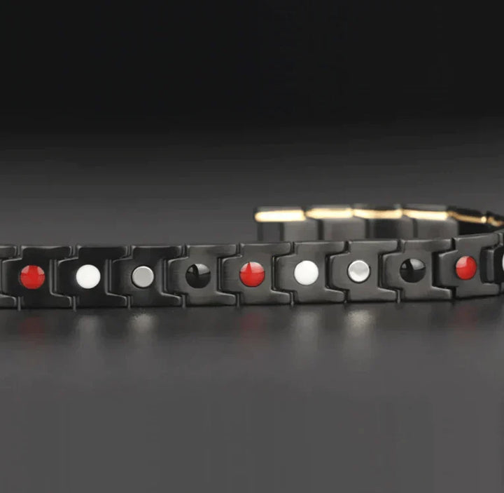 Sleek magnetic therapy bracelet promoting wellness & pain relief. Unisex health jewelry.