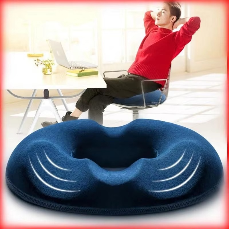 Memory foam donut cushion for daily use, providing tailbone support and pressure relief.