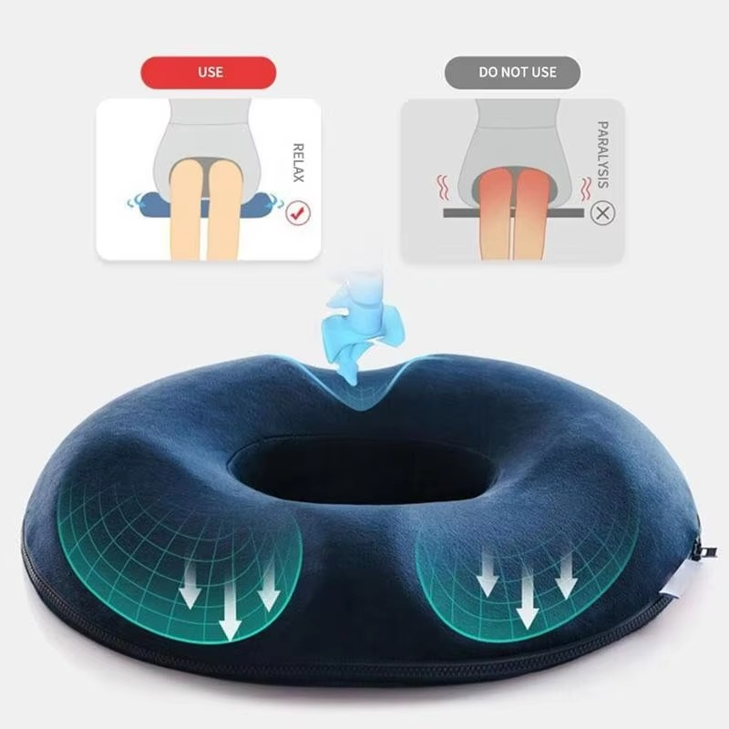 Unisex memory foam donut seat cushion for coccyx support and lower back comfort.