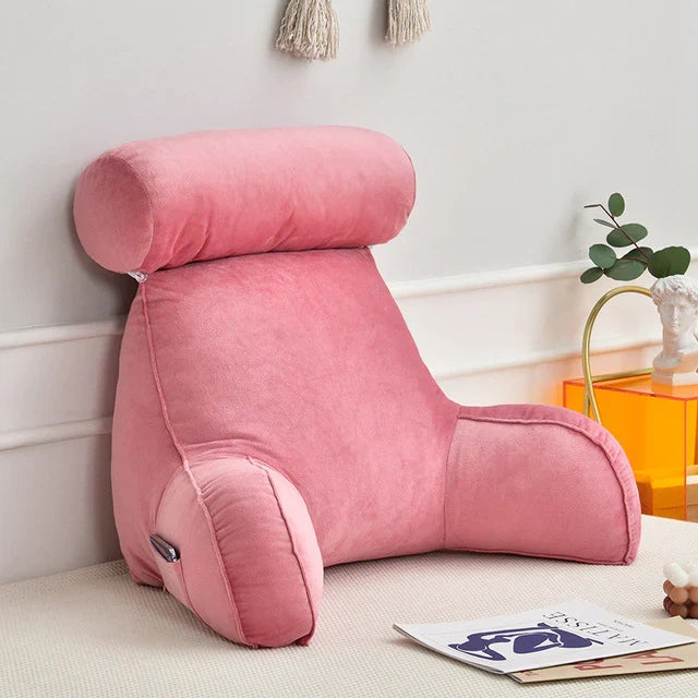 Premium memory foam reading bed pillow with integrated arm rests for ultimate lounge relaxation.