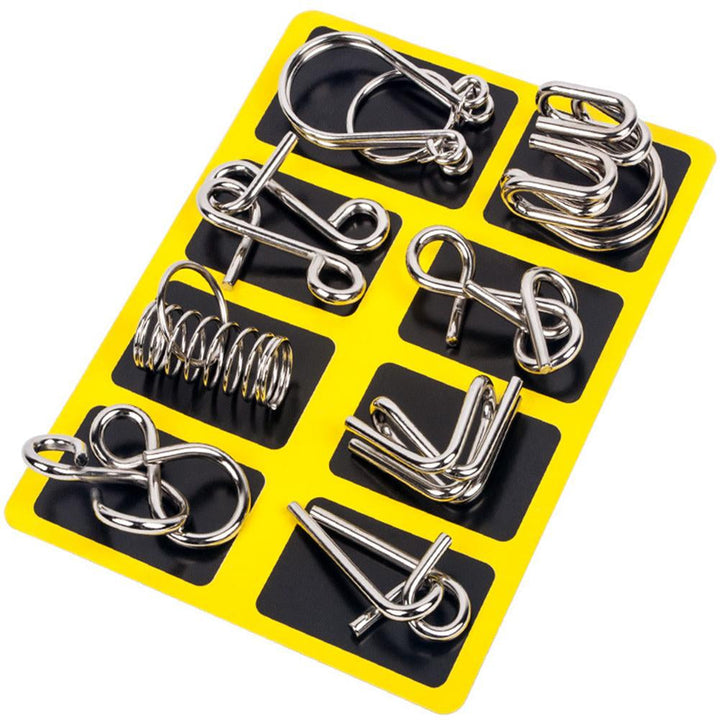 Educational adult game: a set of challenging metal brain teaser puzzle rings.