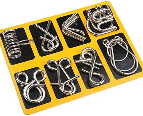 Close-up of a complex metal brain teaser ring, part of a challenging puzzle set.
