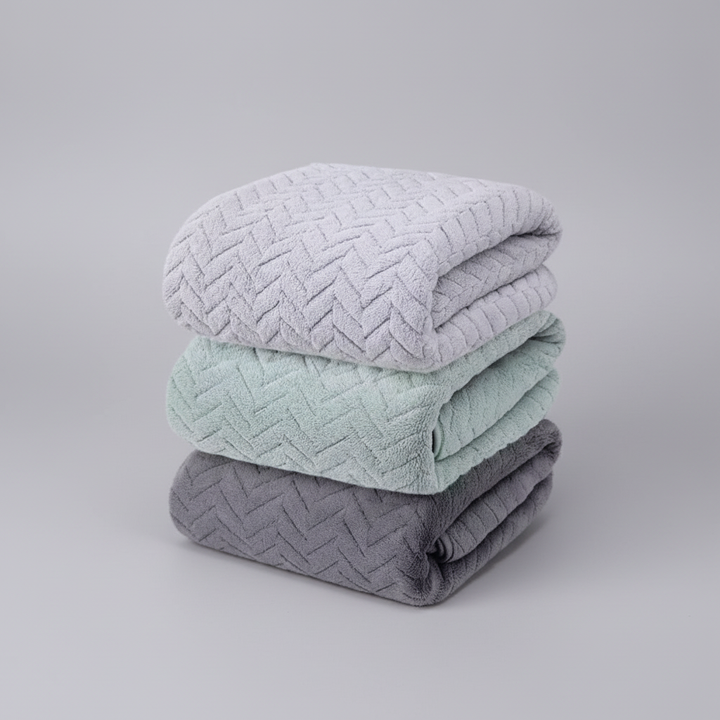 Close-up of a high-quality microfiber bath towel, highlighting its absorbent weave and plush feel.