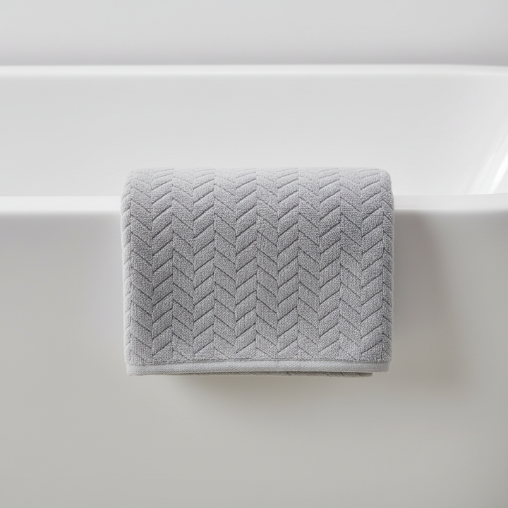 Arrangement of a microfiber bath towel set with a focus on its easy-care nature, perfect for any bathroom decor.