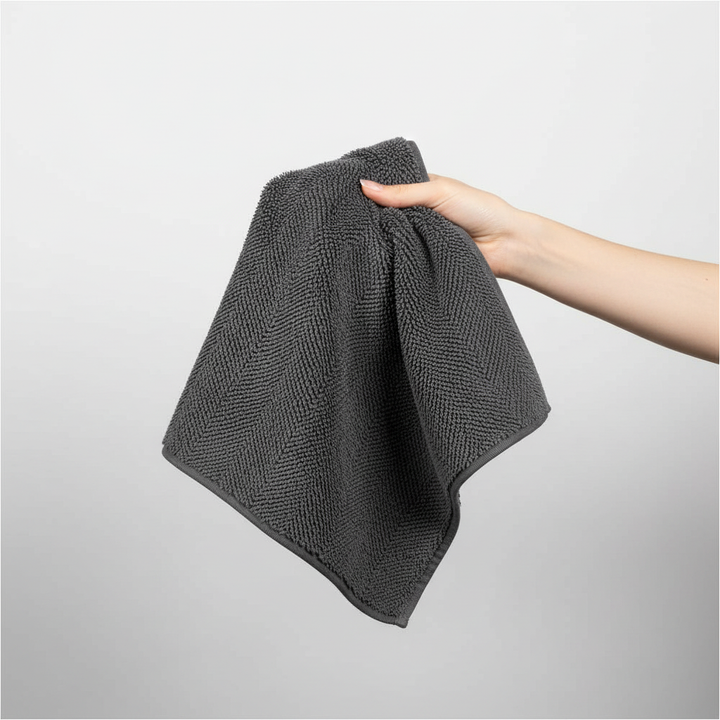 Purple microfiber cleaning cloth, essential for bathroom and household cleaning; MicroWonder technology