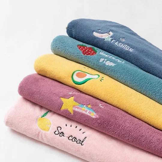 Efficient quick-dry microfiber hair towel, a lightweight bath accessory for all genders.