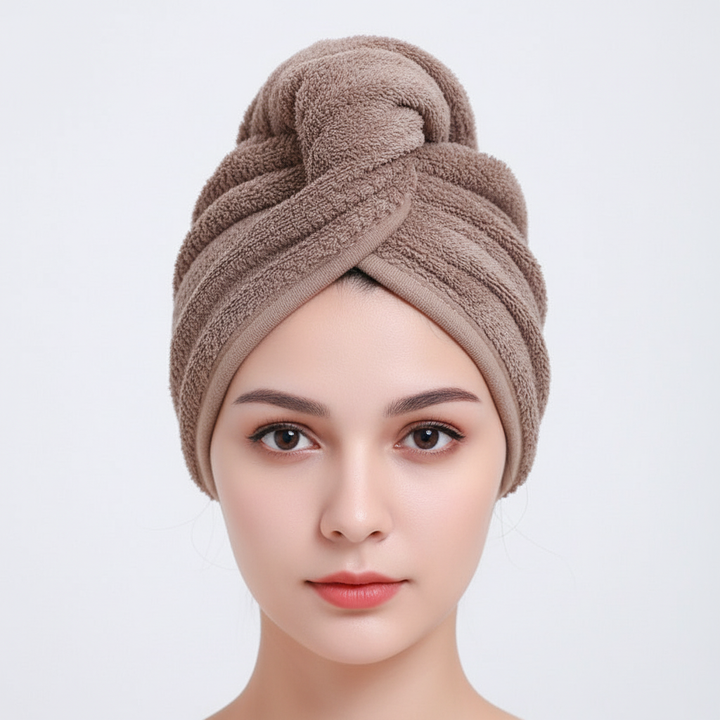 Unisex microfiber hair drying towel wrap in a soft pink, gentle on all hair types