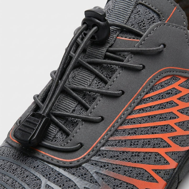Close-up of the breathable mesh fabric on a unisex barefoot shoe, highlighting flexible design