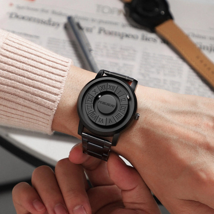 Unisex stainless steel watch. Minimalist design, black dial, magnetic display, and refined Roman numerals. Modern style.