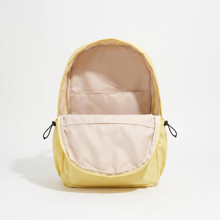 Lightweight urban minimalist backpack, unisex design for daily essentials & commute, durable nylon construction.