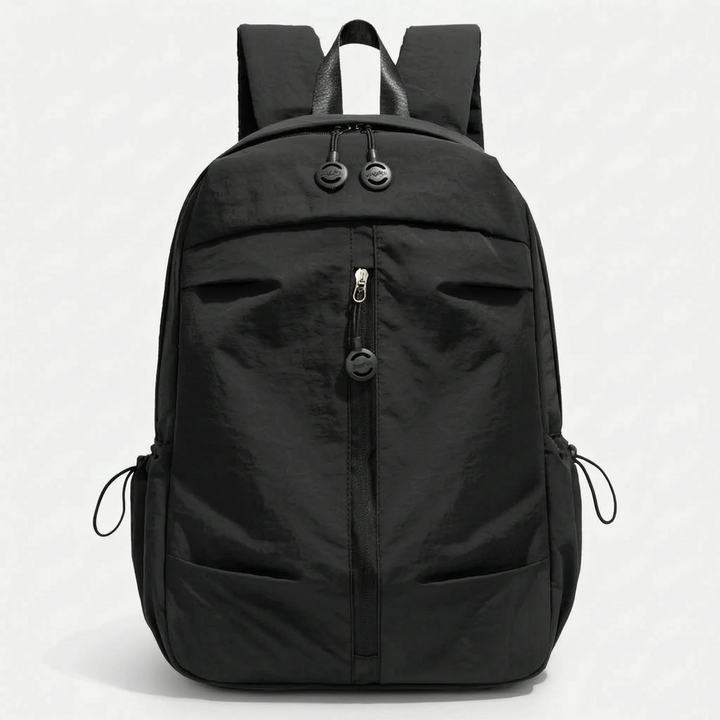 Minimalist everyday backpack in a sleek design, versatile for urban exploration & outdoor activities, lightweight nylon.