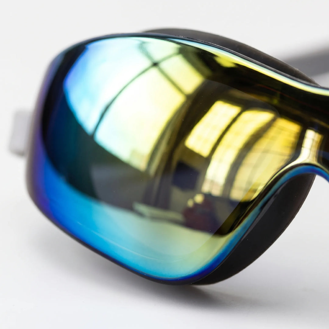 Adjustable unisex mirrored swim goggles offering anti-glare protection for swimming in sunlit pools.