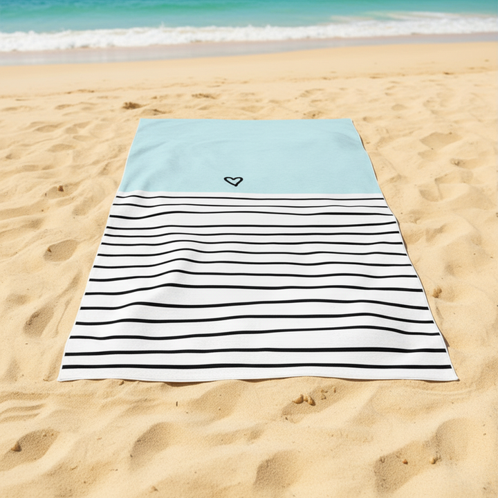 Unisex modern fast-dry coastal beach towel with blue wave pattern on sand