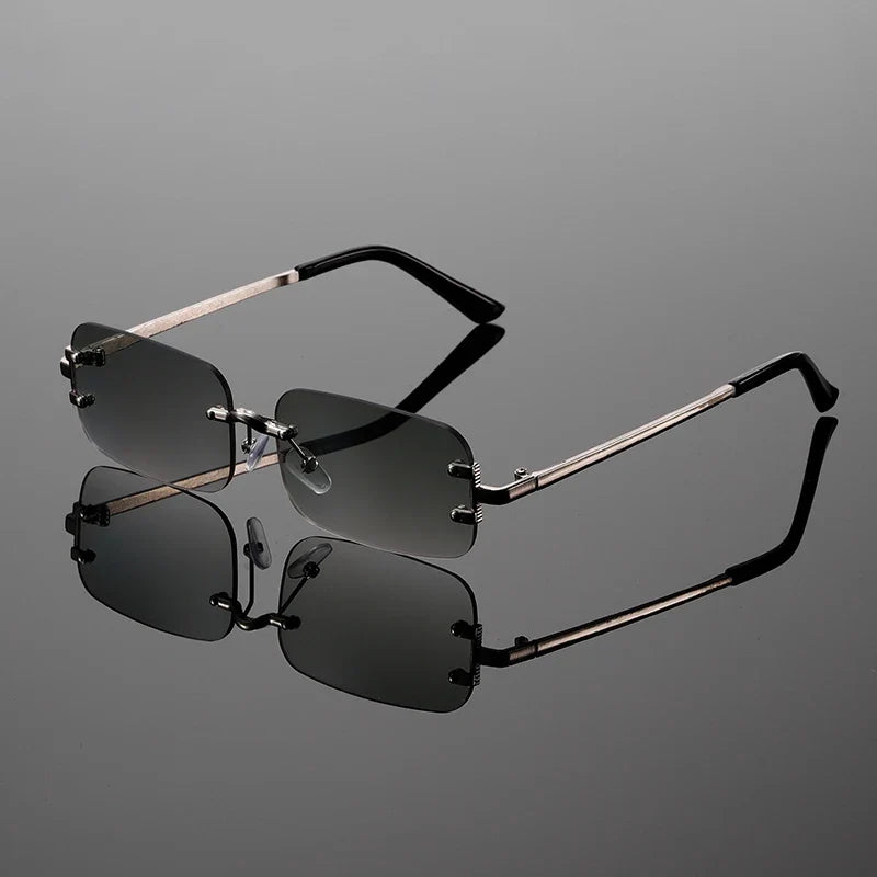 Unisex modern rectangular rimless sunglasses; trendy eyewear providing excellent UV400 protection and style.