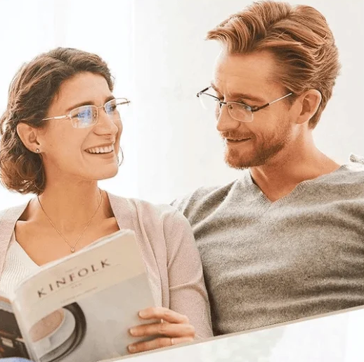 Titanium unisex multifocal anti-blue light reading glasses for vision aid & digital eye strain protection.