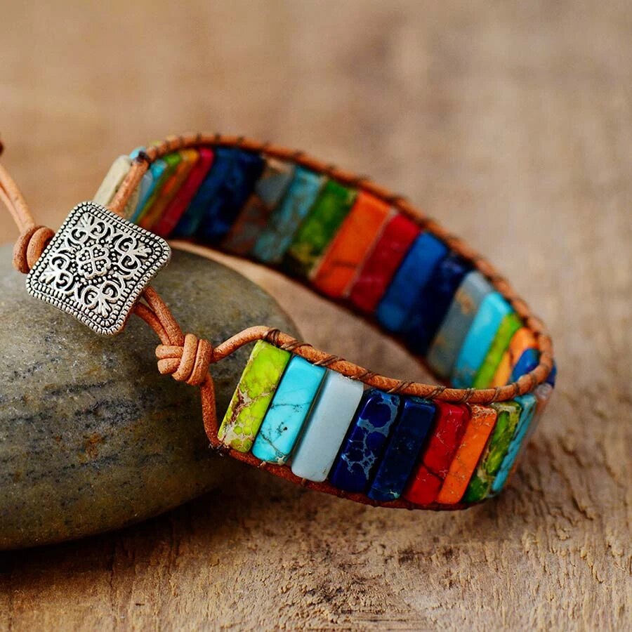 Genuine Tibetan Rainbow Jasper gemstone bracelet. Handcrafted spiritual jewelry for energy healing & balance.