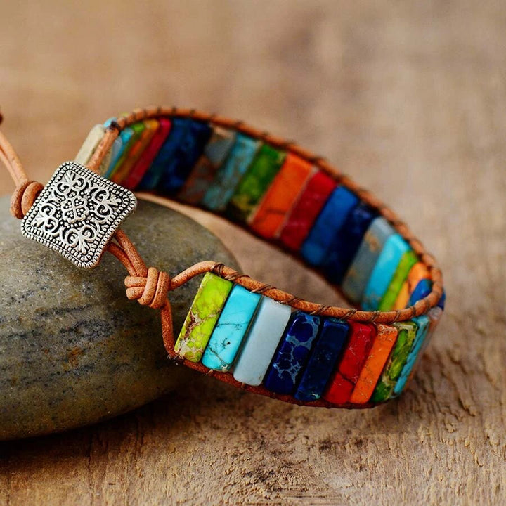 Genuine Tibetan Rainbow Jasper gemstone bracelet. Handcrafted spiritual jewelry for energy healing & balance.