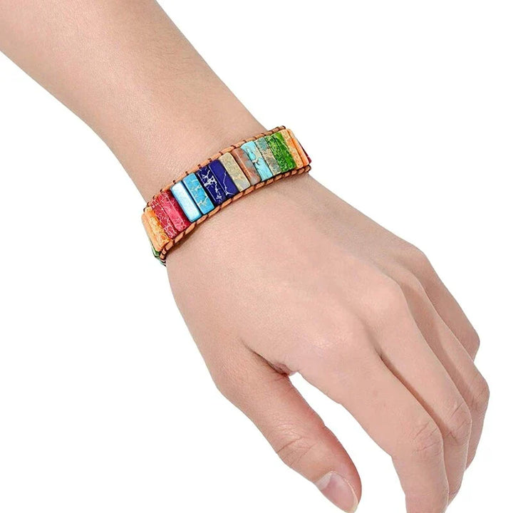 Mystic Journey unisex bracelet featuring colorful Tibetan Rainbow Jasper. Spiritual gemstone jewelry for wellness.
