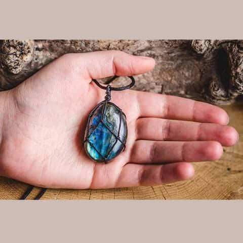 Iridescent Labradorite Dragonheart necklace, a mystical unisex gemstone pendant. Handmade spiritual energy jewelry.