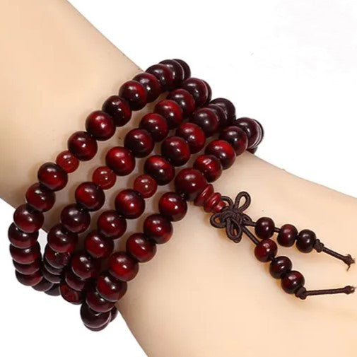 Handcrafted natural wood prayer beads bracelet. Mindful gift, durable spiritual accessory.
