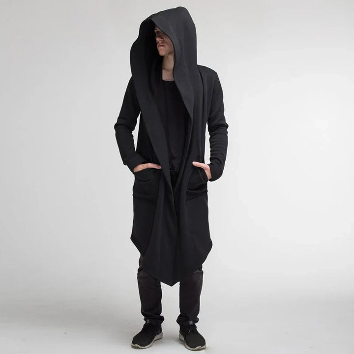 Unisex Nightfall Coat with draped hood and relaxed fit. Stylish and comfortable outerwear with deep pockets.