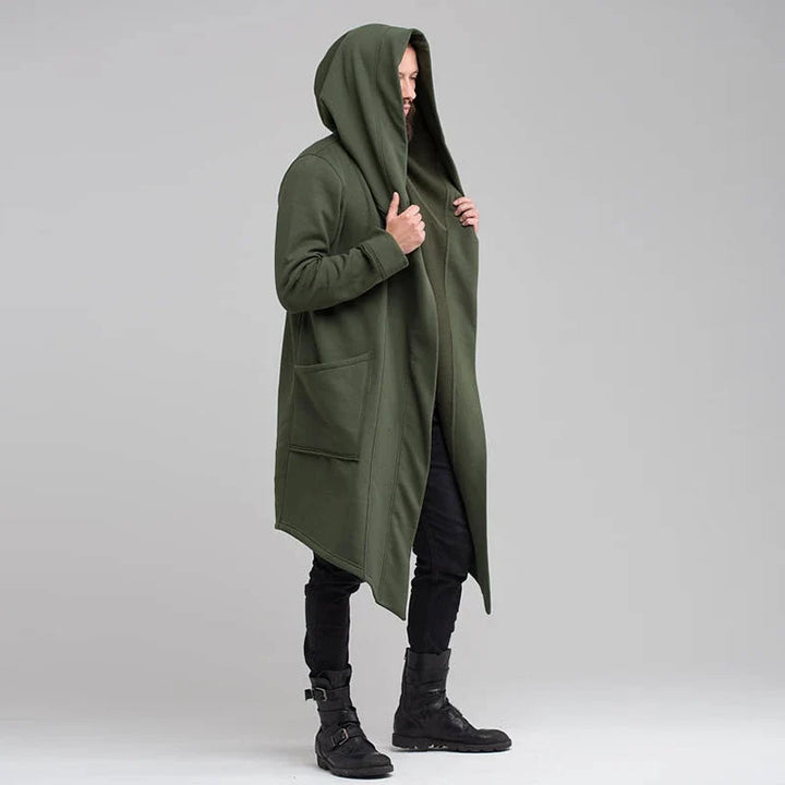 Stylish Nightfall unisex coat with a draped hood, deep pockets, and a relaxed fit for versatile outerwear.