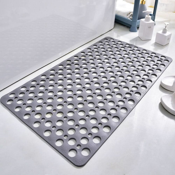 Unisex non-slip bath mat ensures secure footing & fall prevention in wet showers.