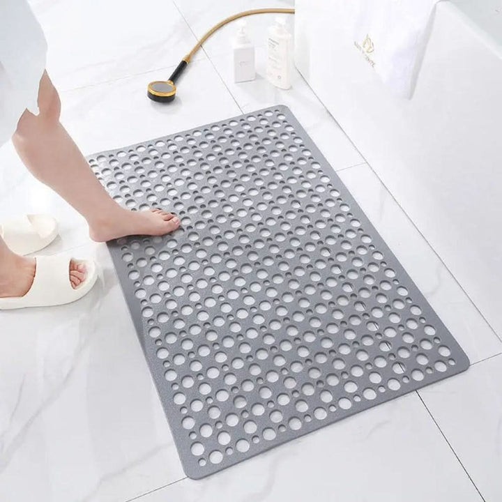 Modern non-slip bath mat, unisex, offers superior grip & comfort in wet bathroom areas.