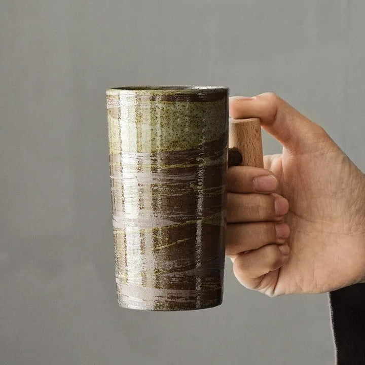Close-up of an earthy ceramic Nordic latte mug, showcasing its unique texture & natural earthenware finish.