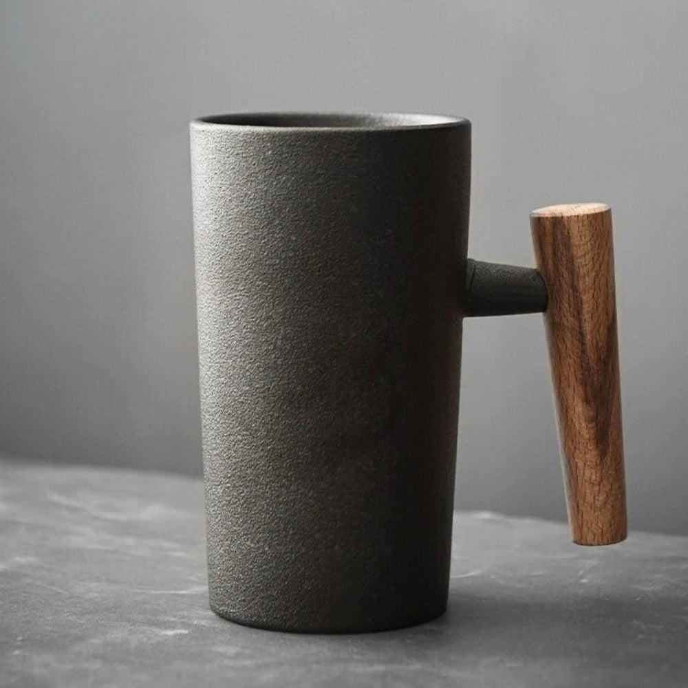NatureSip Nordic latte mug, earthy ceramic design & wood handle for a natural coffee or tea experience.