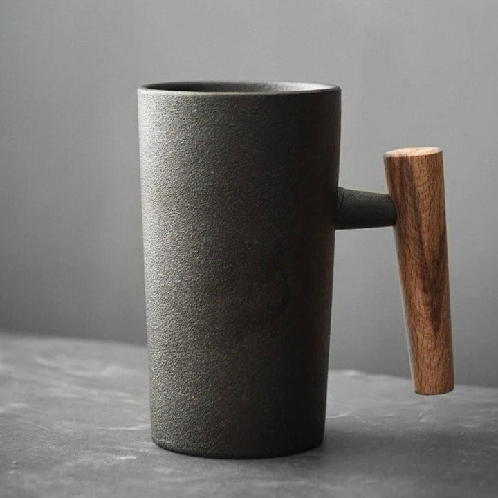 NatureSip Nordic latte mug, earthy ceramic design & wood handle for a natural coffee or tea experience.
