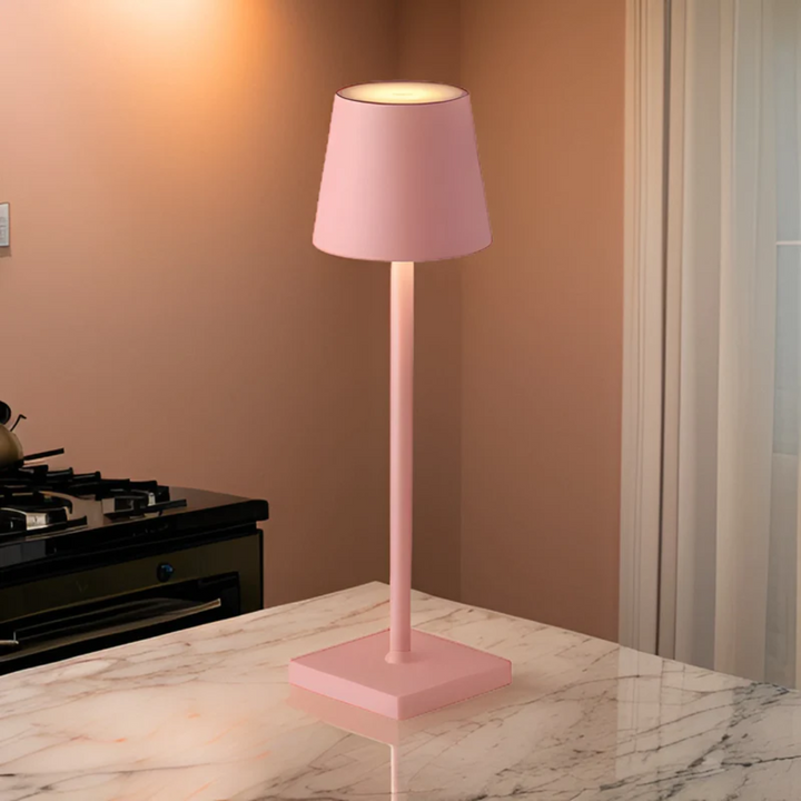 Sleek aluminum LED table lamp with responsive touch control & dimmable light settings. Rechargeable, wireless.