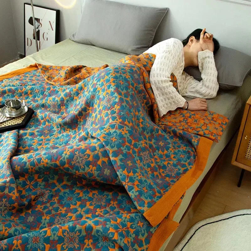 Vibrant orange and blue pattern six-layer cotton quilt, perfect bedding and duvet for a comfortable home.